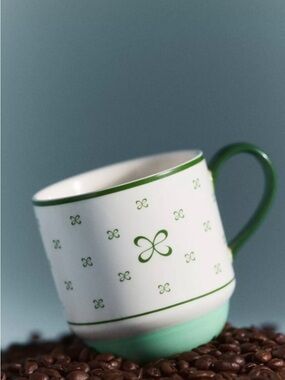 Anthropologie White and Green Patterned Ceramic Mug
